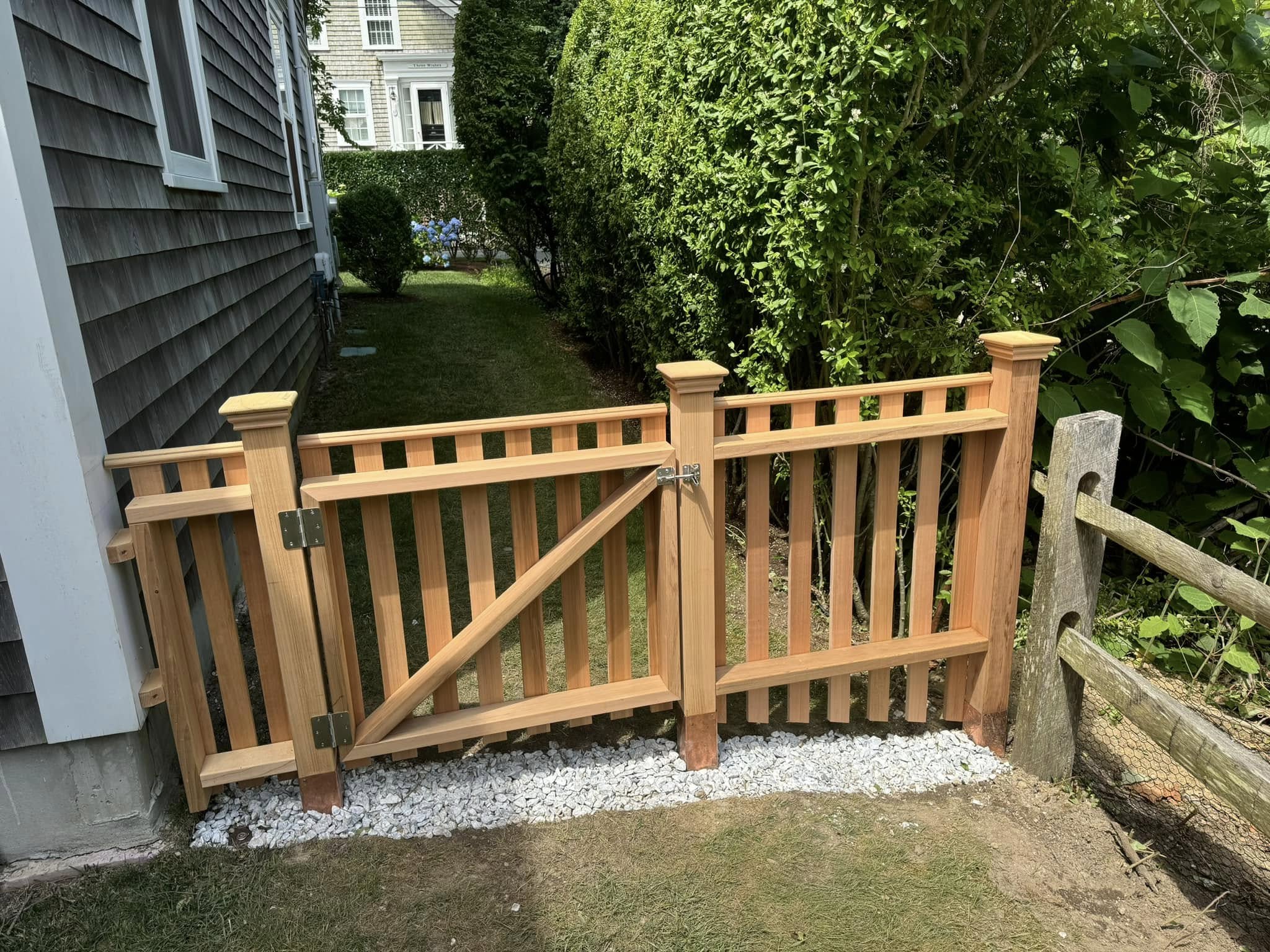 Custom cedar fence and gate on Nantucket property